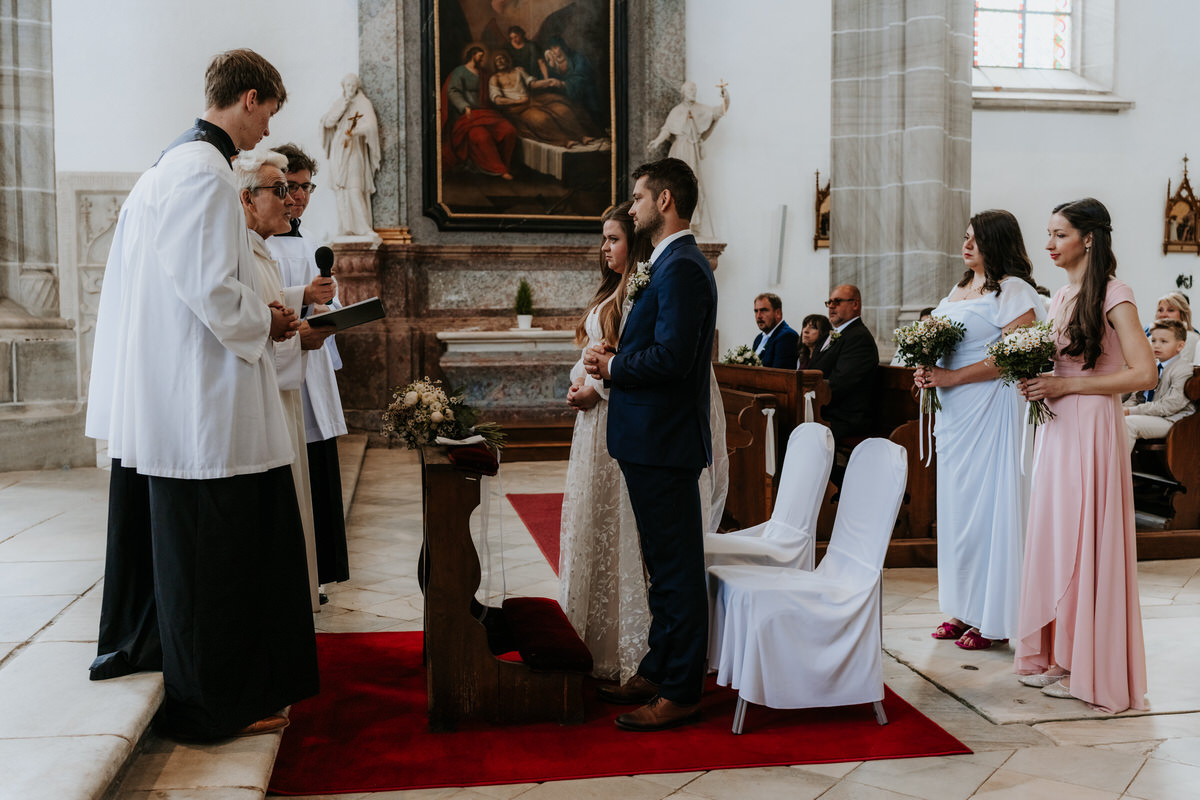 Doubravník - a church ceremony, the priest marries the engaged couple.