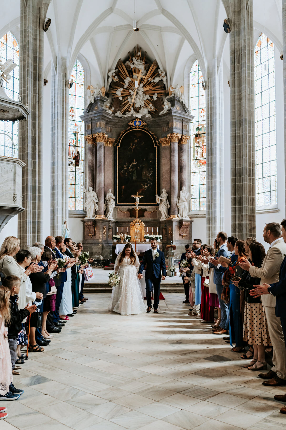 Wedding Doubravník - the bride and groom walk down the aisle as husband and wife.