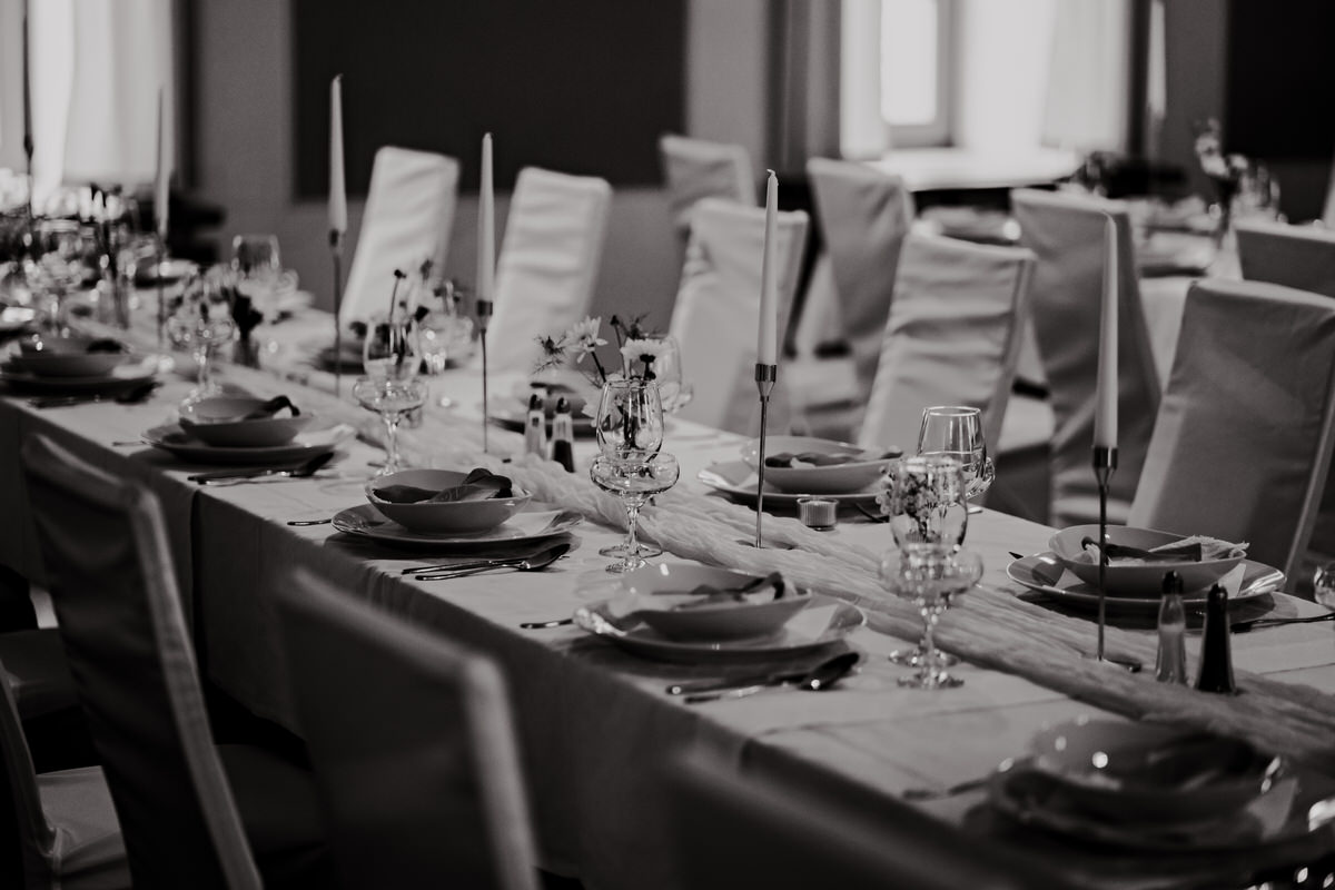 Black and white photo of elegant wedding decorations.