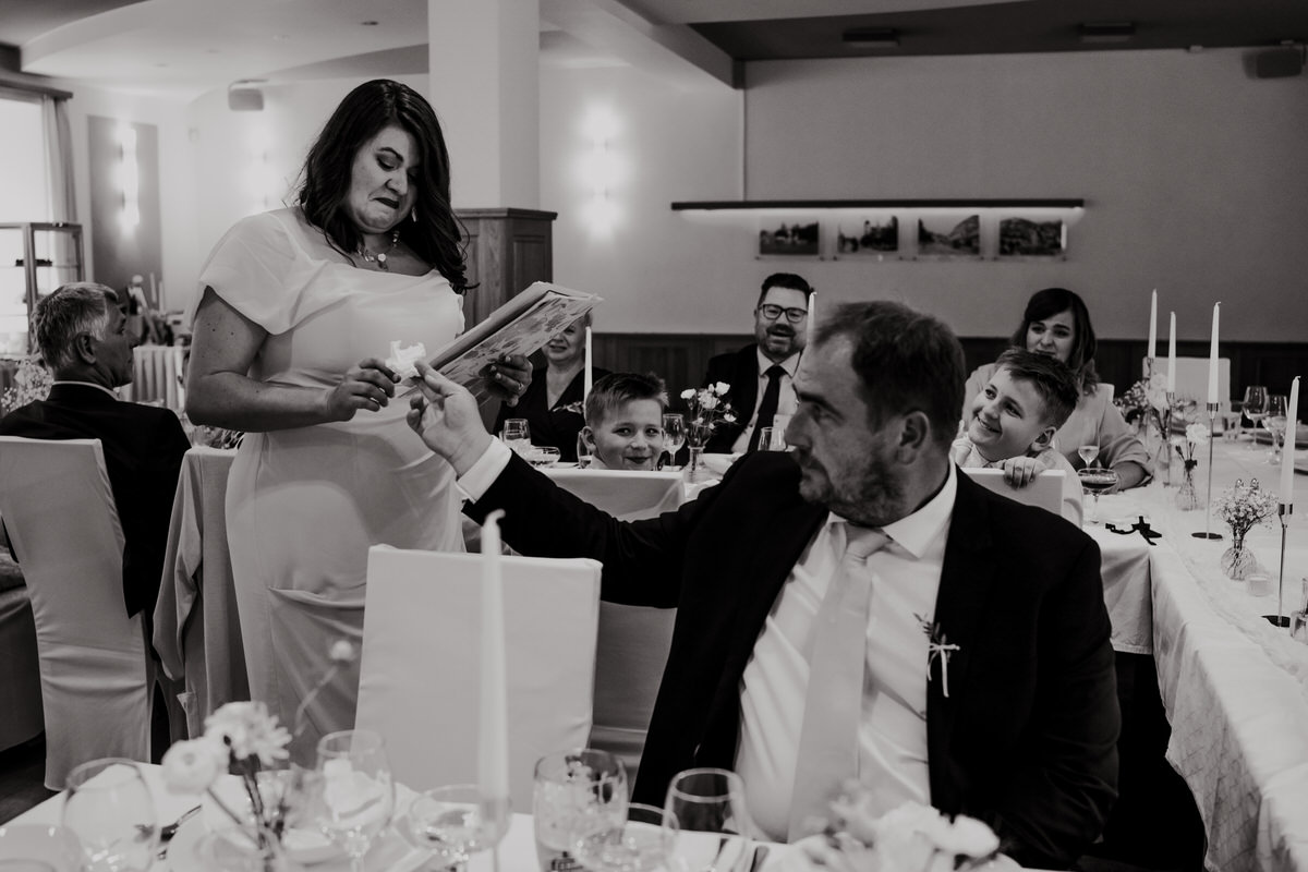 The bride's sister makes a toast.