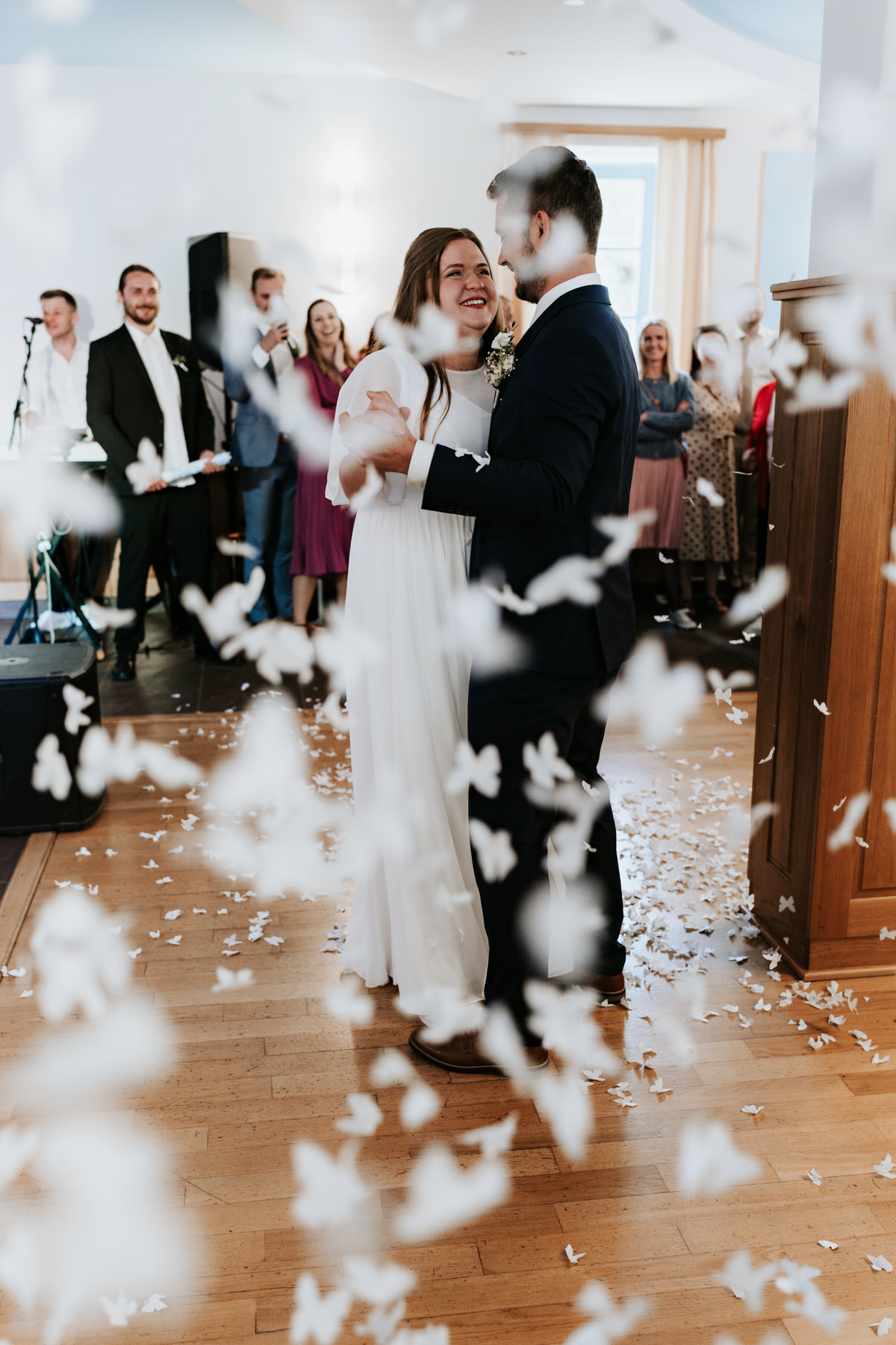 Confetti during the newlyweds' first dance in Doubravník.