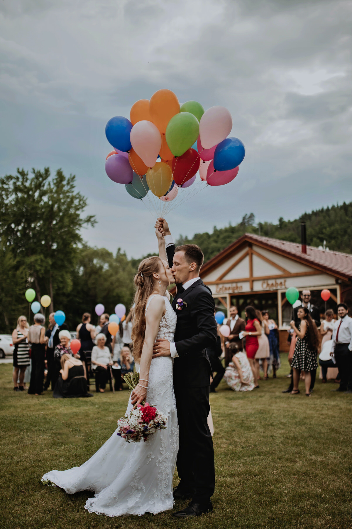 73_resort-chobot-wedding-photographer-monika-chano Newlyweds take pictures with inflatable balloons.