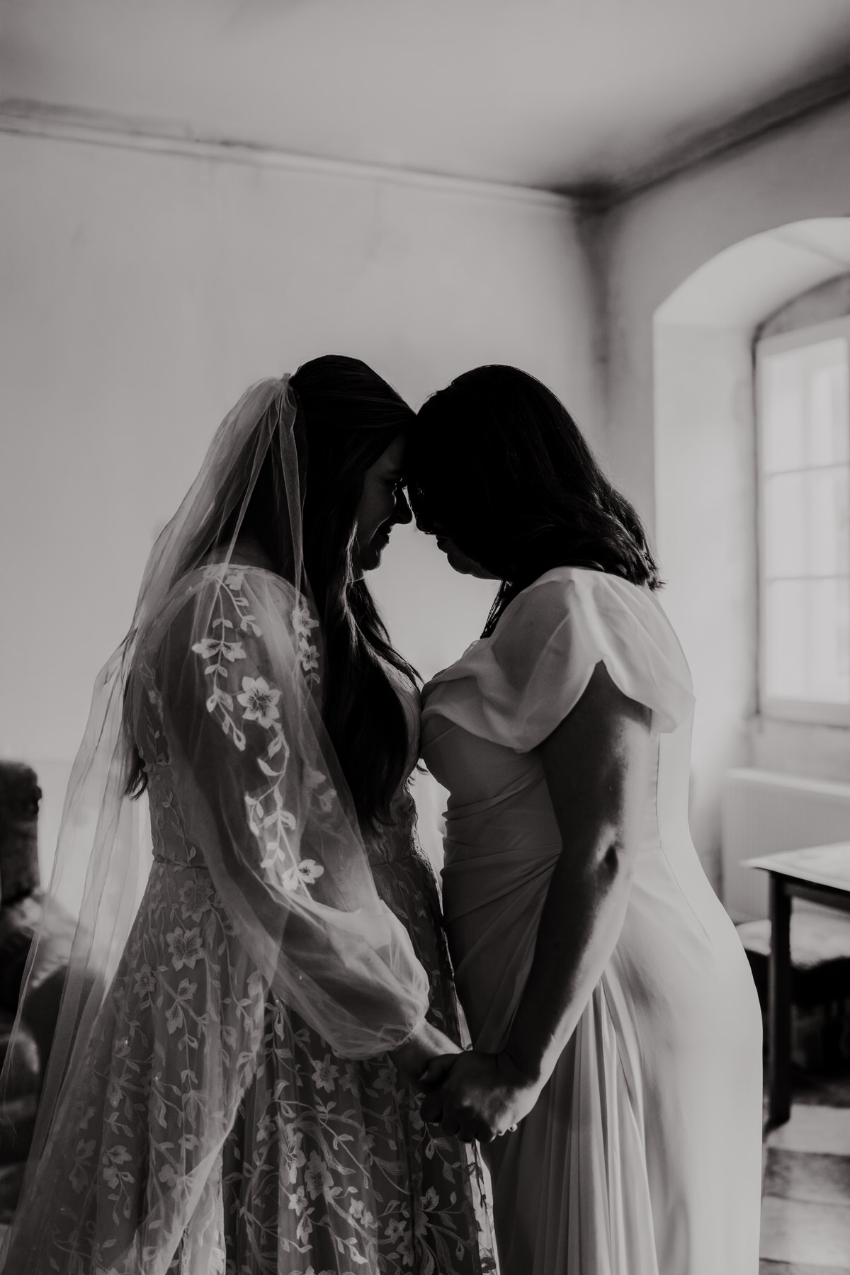 Doubravník wedding - A touching, intimate moment between a bride and her sister.