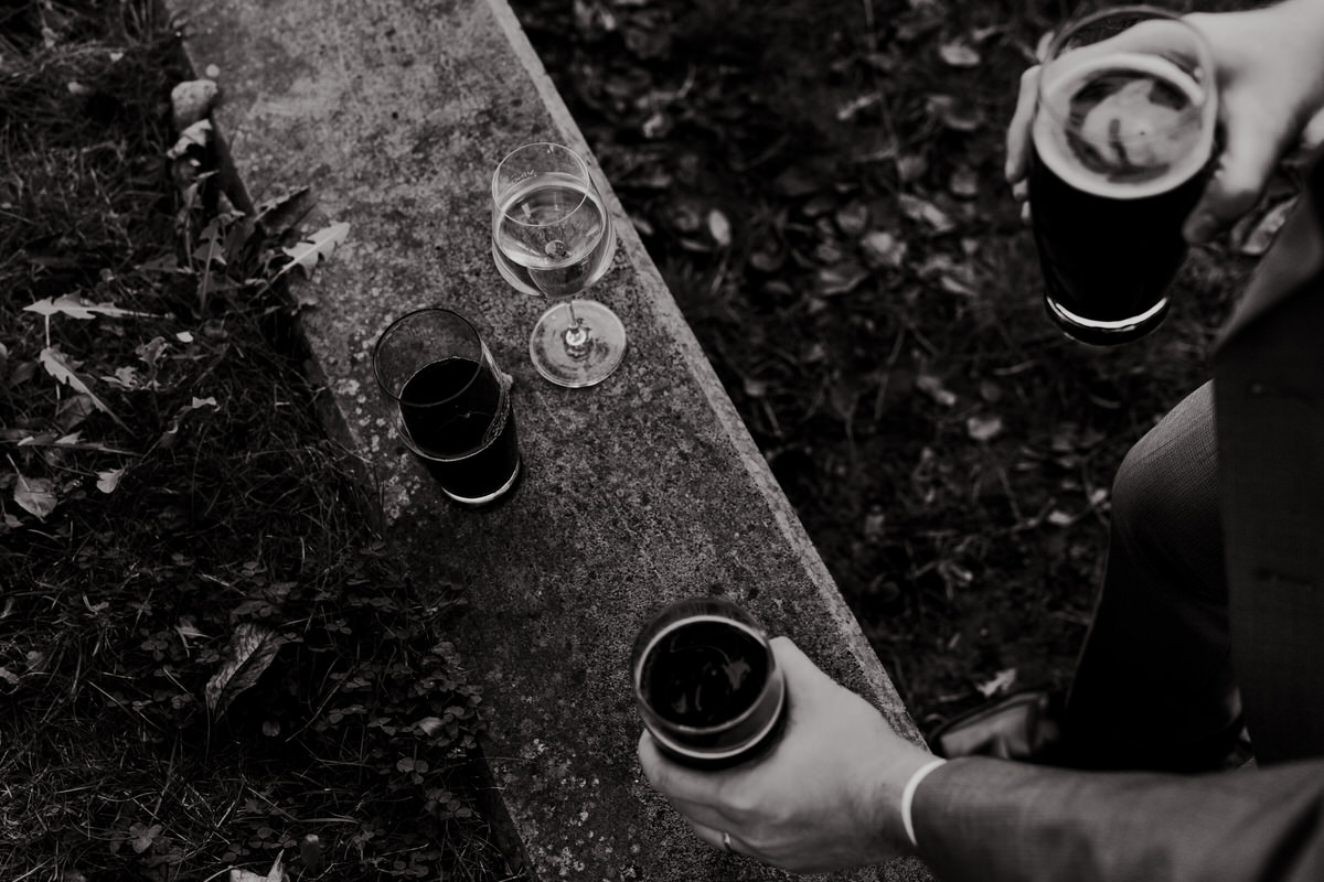 The newlyweds decorate their huge tiramisu wedding cake.