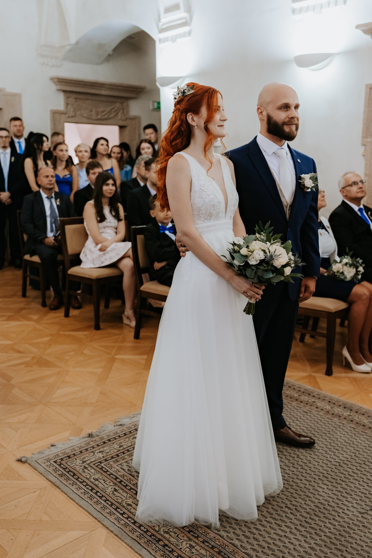 Wedding at Hradec Králové - Bride and groom during their wedding ceremony.