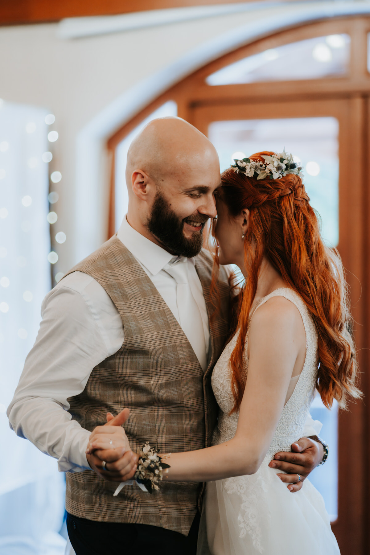 Closeup of newlyweds during their first dance.