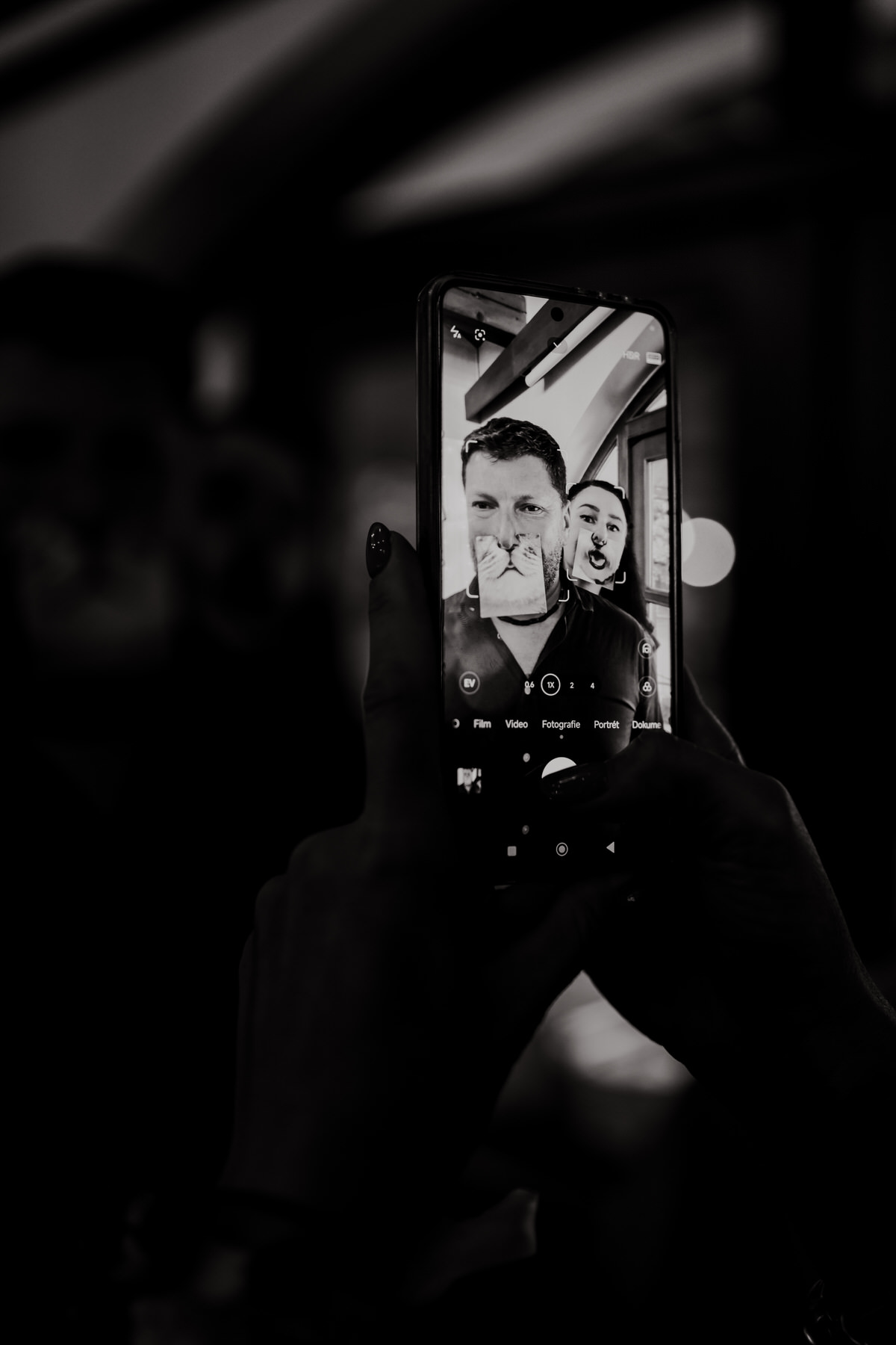 A funny snapshot of wedding guests enjoying a dance party.