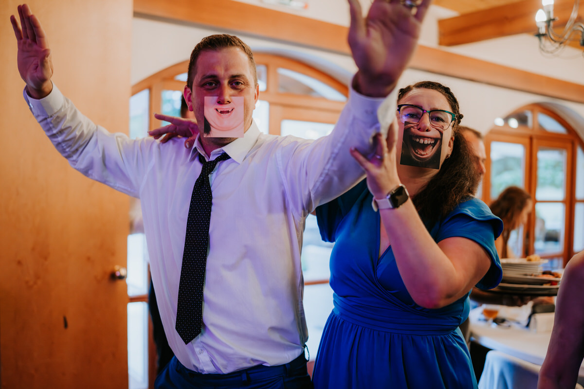 Hradec Králové wedding - a funny photo of wedding guests during the evening party.