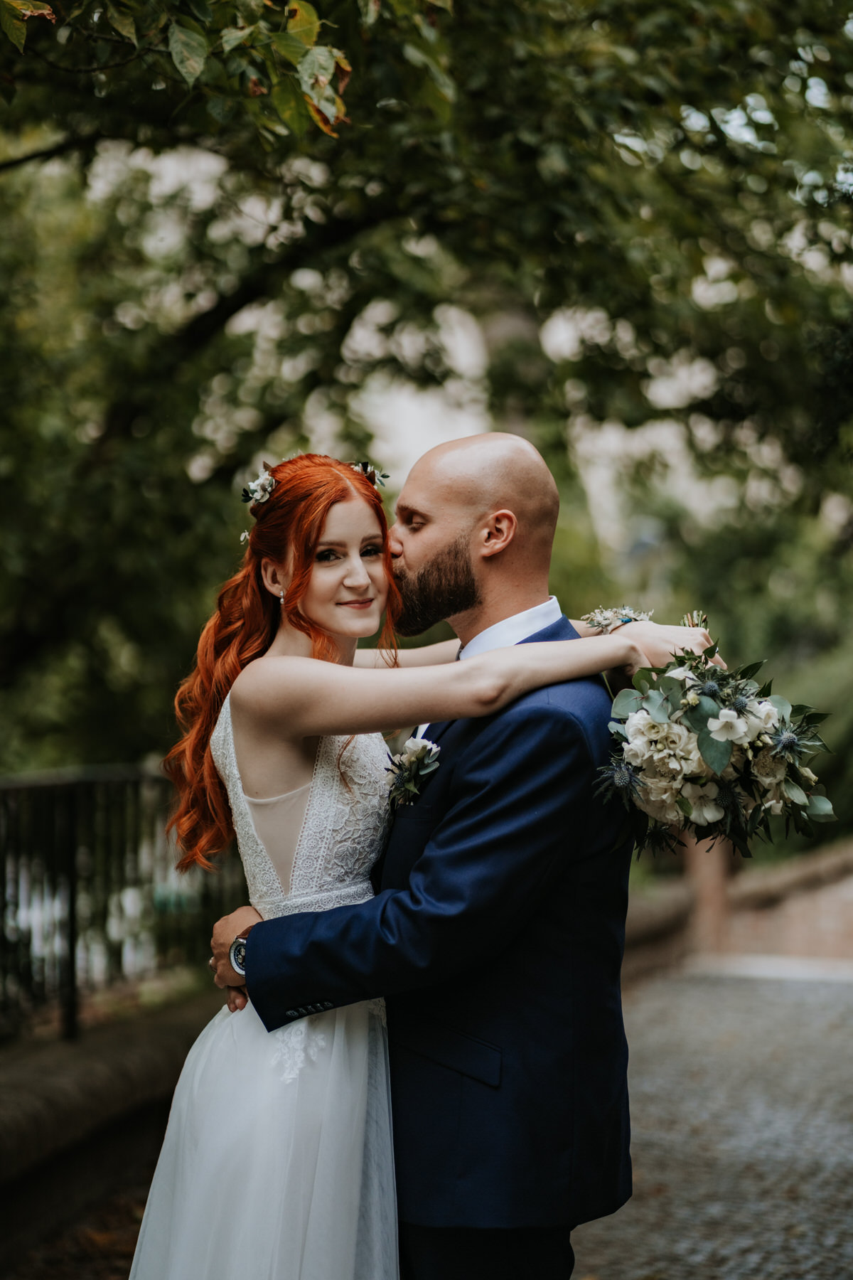 The bride and groom during their wedding photo shoot, wedding Hradec Králové.